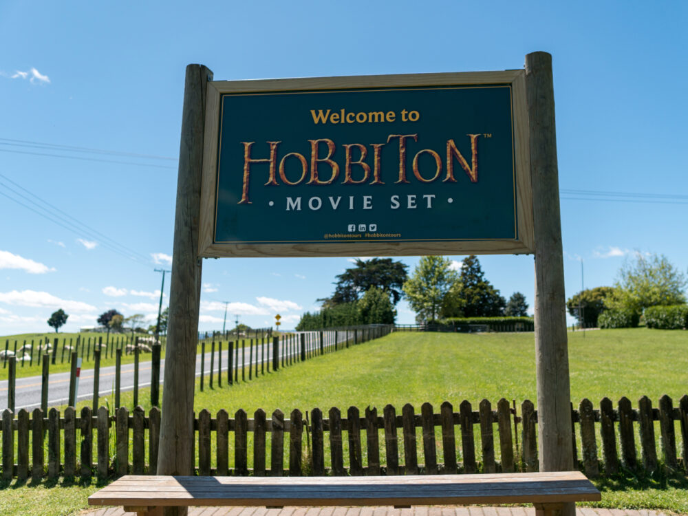 Sign that says Welcome to Hobbiton Movie Set for a piece on Lord of the Rings filming locations