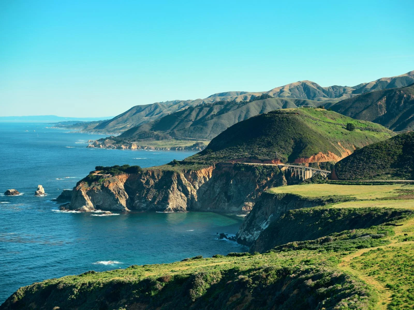 Astonishing coastal seascape and distinct green land formation in Big Sur, California is one of the most beautiful places in the US