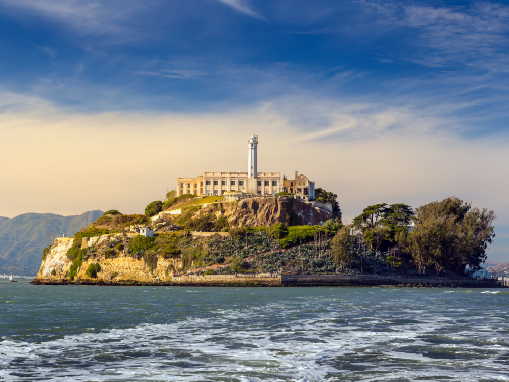 Tourists visiting what used to be military facilities and military prison of Alcatraz Island in San Francisco, one of the most iconic places in America, where the whole island is encircled by deep sea