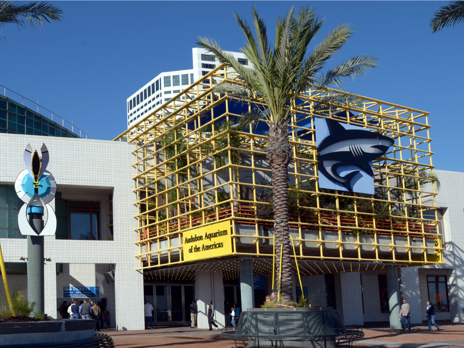 The design at the entrance of the Audubon Aquarium of the Americas, named one of the best aquariums in the US, is made to imitate a shark cage with a shark image on the front