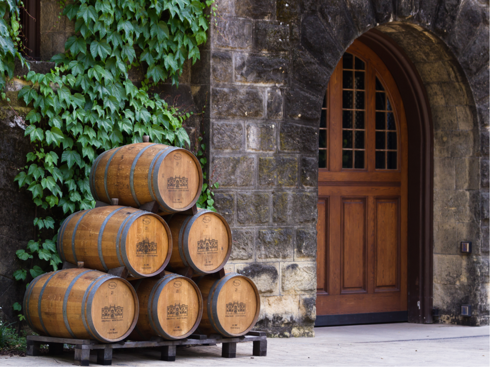 Calistoga wine barrels outside Chateau Montelena during the best time to go to Napa Valley