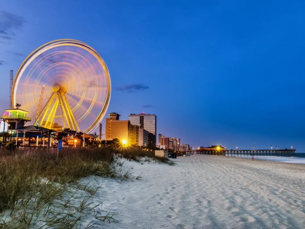 Empty beach pictured at night during the best time to visit Myrtle Beach South Carolina