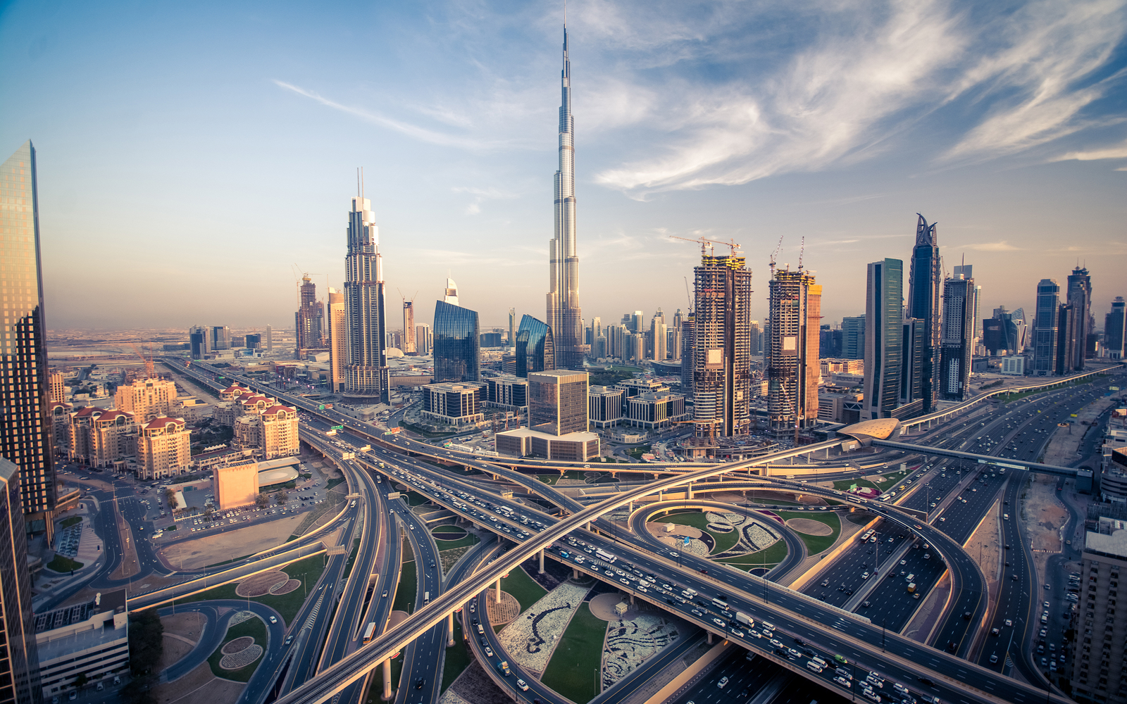 Featured image for a post titled Is Dubai Safe featuring a day skyline with lots of streets and buildings