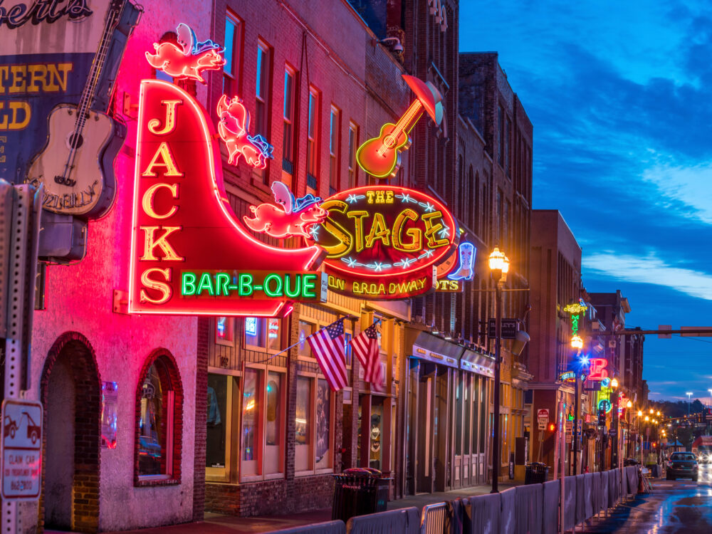 Historic Lower Broadway area pictured at night during the best time to go to Nashville Tennessee