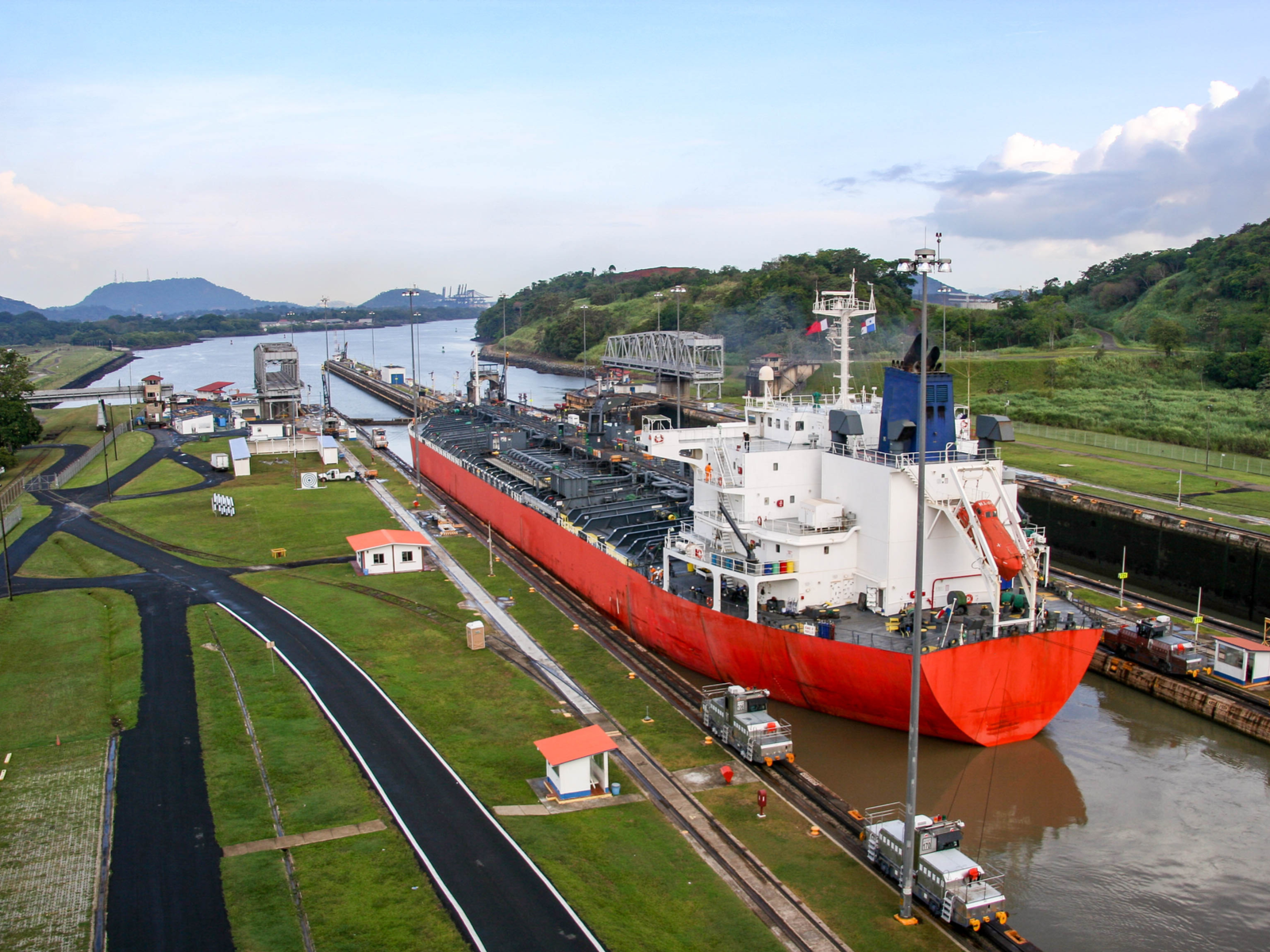 For a piece titled Is Panama Safe, a giant oil tanker in the first lock leading to the Panama Canal