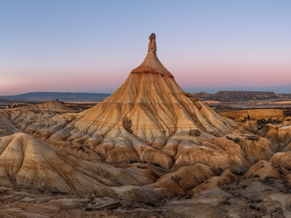 A magnificent natural rock formation at a desert region on Bardenas Reales Natural Park in Spain, one of many Game of Thrones filming locations you can visit