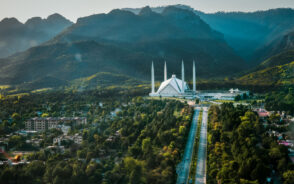 For a piece titled Is Pakistan Safe to Visit, a photo of a mosque on the hillside