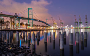 Featured image for a piece titled Is Long Beach Safe to Visit featuring the Vincent Thomas Bridge between Long Beach and San Pedro