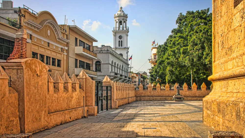 Historic City Center Plaza with Skyline of Colonial Buildings and Church during the best time to go to the Dominican Republic