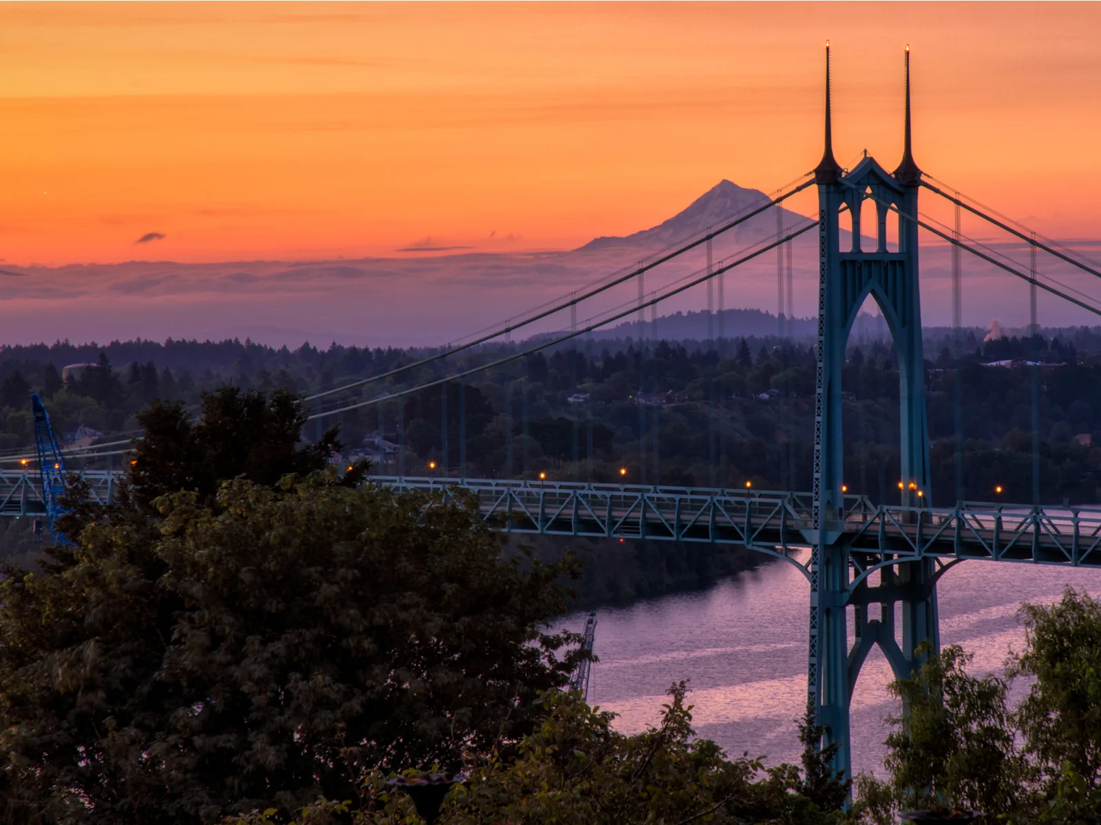 Gothic style bridge pictured in front of Mount Hood during the best time to visit Portland Oregon