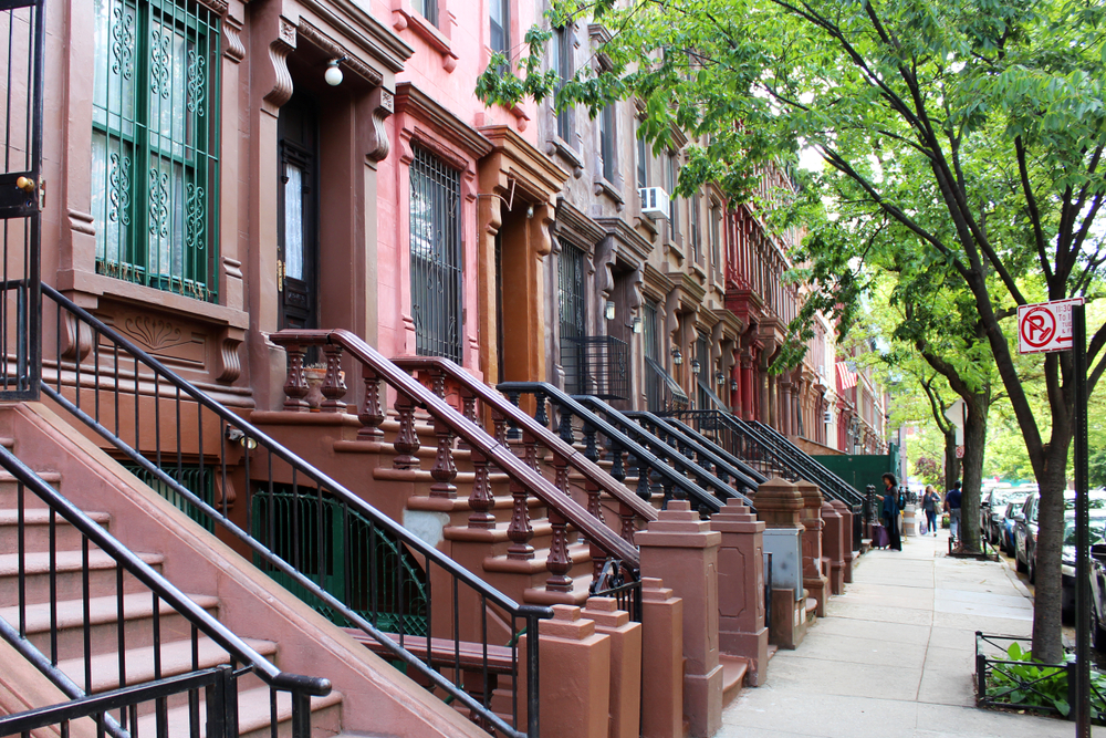 Row of Brownstones in New York for a piece titled Is Harlem Safe to Visit