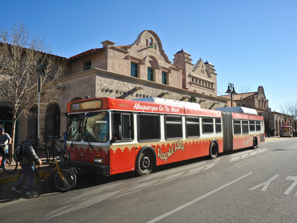 For a post titled Is Albuquerque Safe, a bus is pictured as a great transportation method