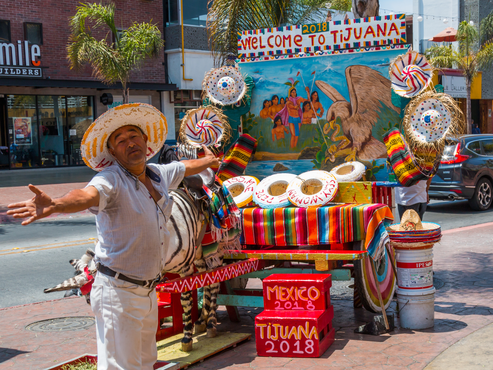 Happy guy in a sombrero selling things in Tijuana
