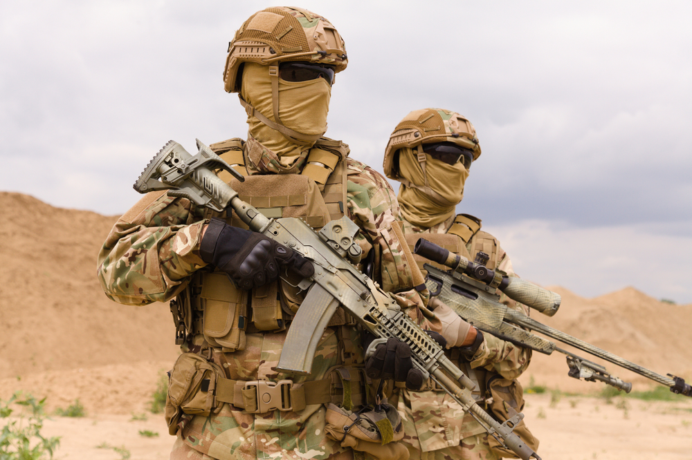 Two special forces soldiers close-up, military anti-terrorism operations concept to illustrate that Afghanistan is unsafe to visit