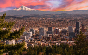 Sunrise view of Portland with a gorgeous pink sky over Mount Hood