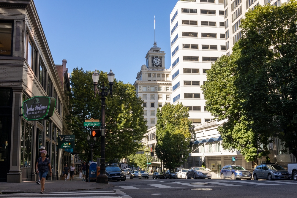 Photo of Portland with blue skies above pictured during the best time to visit Portland with buildings on either side