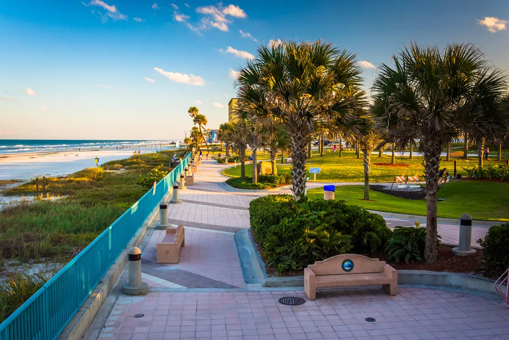 For a piece titled Is Daytona Beach Safe to Visit, a boardwalk and park showing a safe area in the city