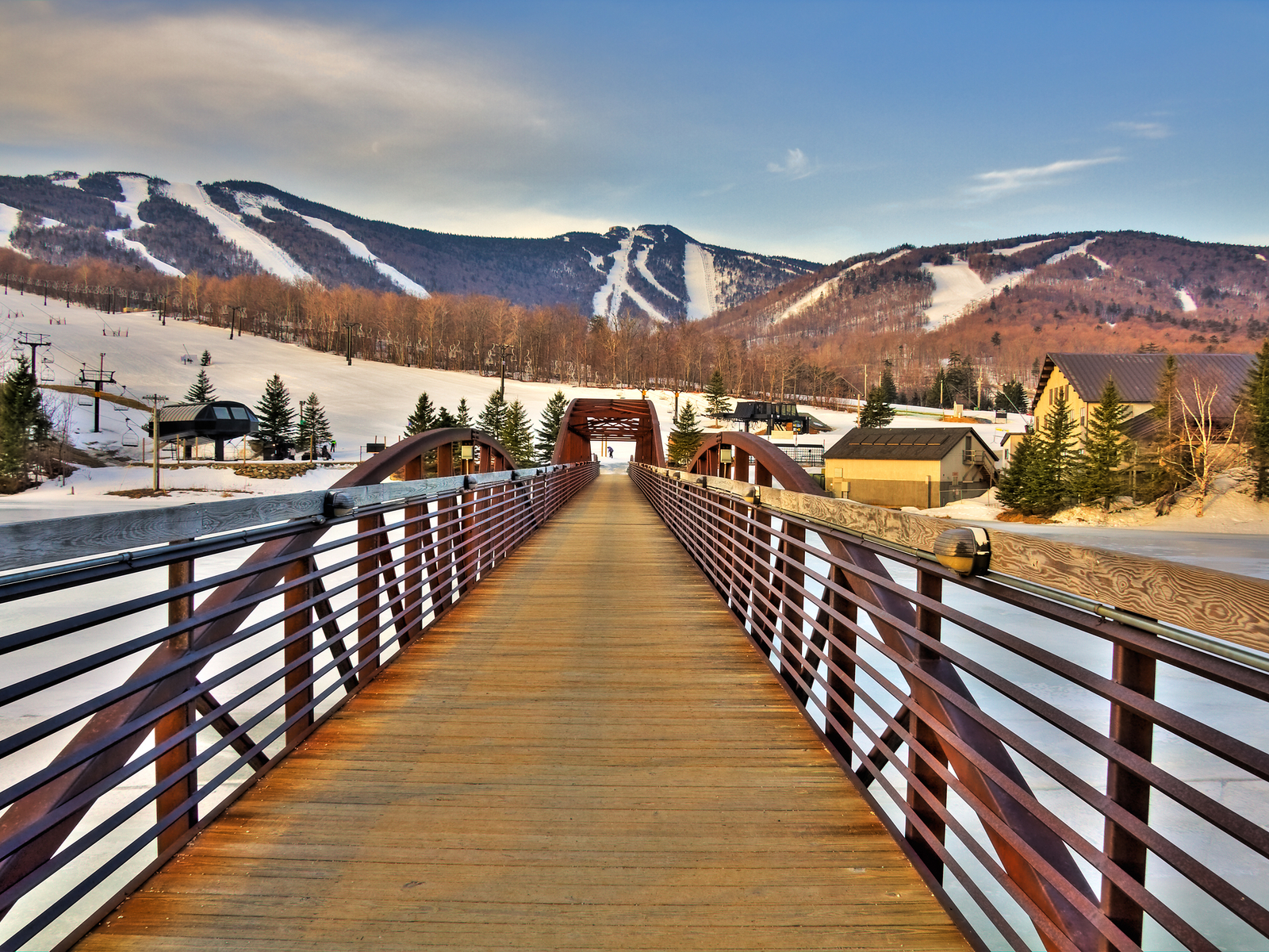 Bridge over a snowy lake in Killington, Vermont