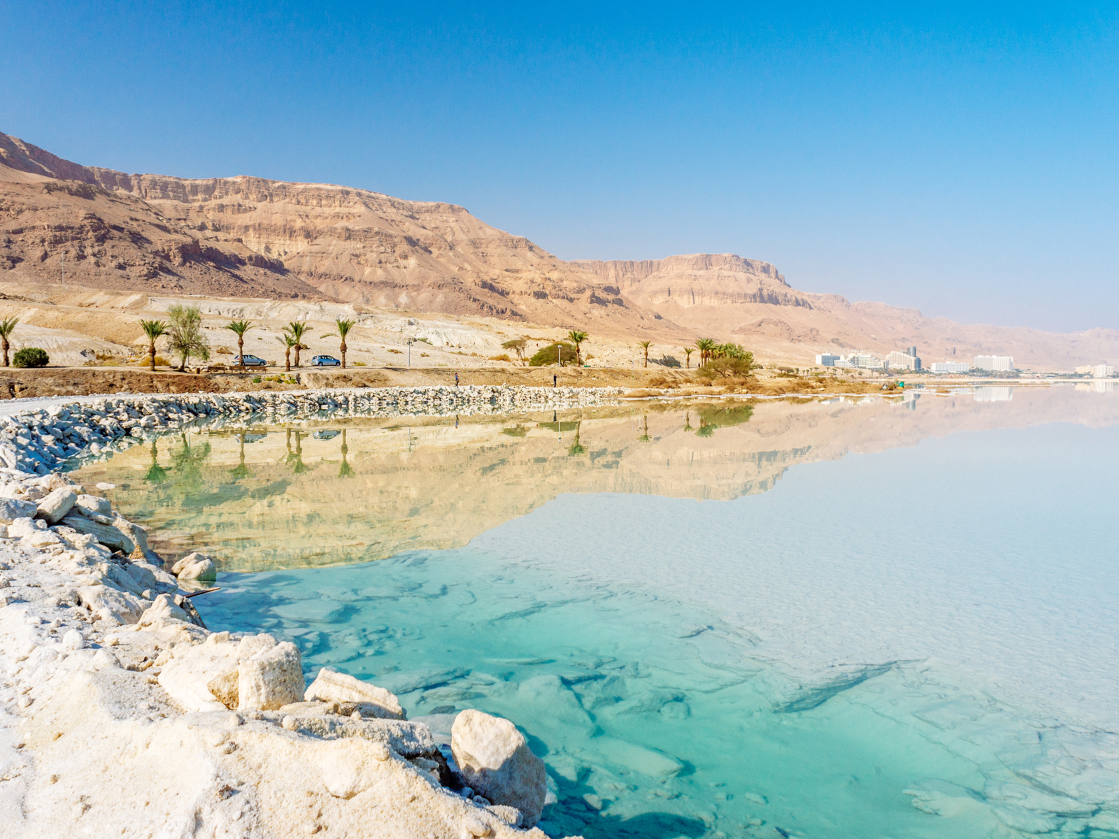 Dead sea coastline with salt deposits pictured during the cheapest time to visit Israel