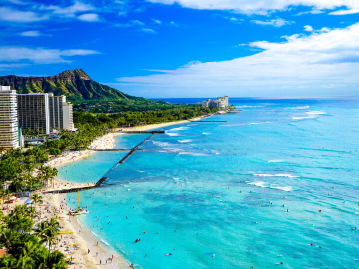 Aerial image of the Waikiki Beach and Diamond Head for a piece on the best things to do in Oahu