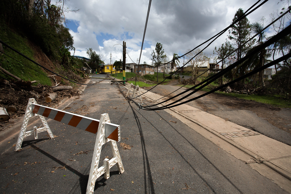 Electrical lines in Puerto Rico after Hurricane Maria to help answer Is San Juan Safe