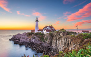 For a piece titled Where to Stay in Maine, the Portland Head Lighthouse pictured on a rocky cliff