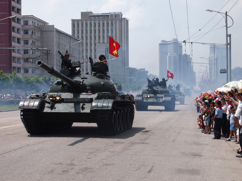 Tanks on front of Pyongyang during the Victory Day Parade for a piece titled Is North Korea Safe to Visit
