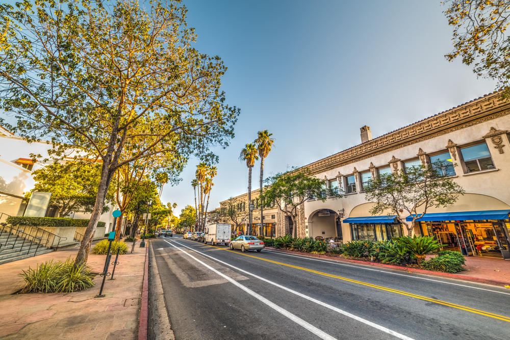Downtown, one of our picks for where to stay in Santa Barbara, pictured with shops on either side of the road