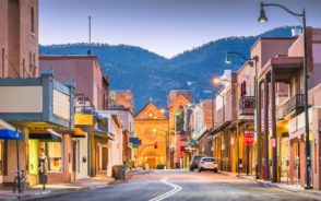 Gorgeous downtown view of Santa Fe pictured during the best time to visit with shops lining the historic downtown area