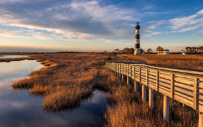 Gorgeous view of the Bodie Island lighthouse for a piece on where to stay in the Outer Banks