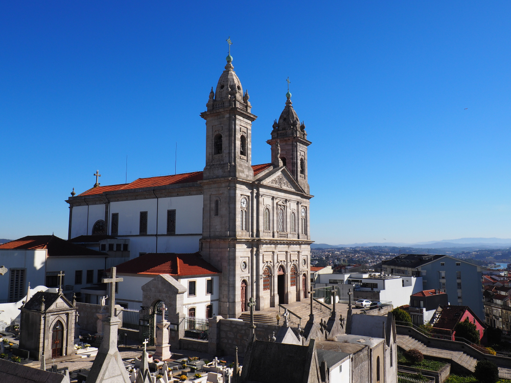 Church Igreja de Nosso Senhor in Bonfim on a clear and sunny day against a blue sky for a piece on where to stay in Porto Portugal