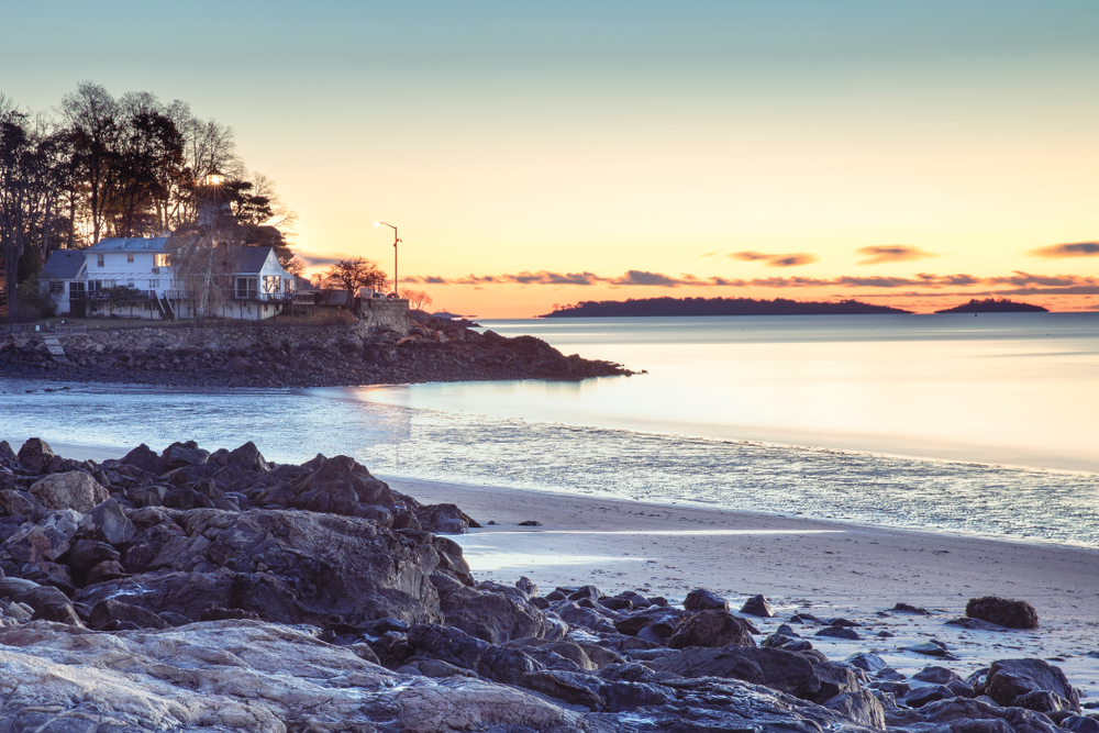 Gorgeous dusk view of Beverly, one of our top picks when debating where to stay in Salem MA, shown at dusk