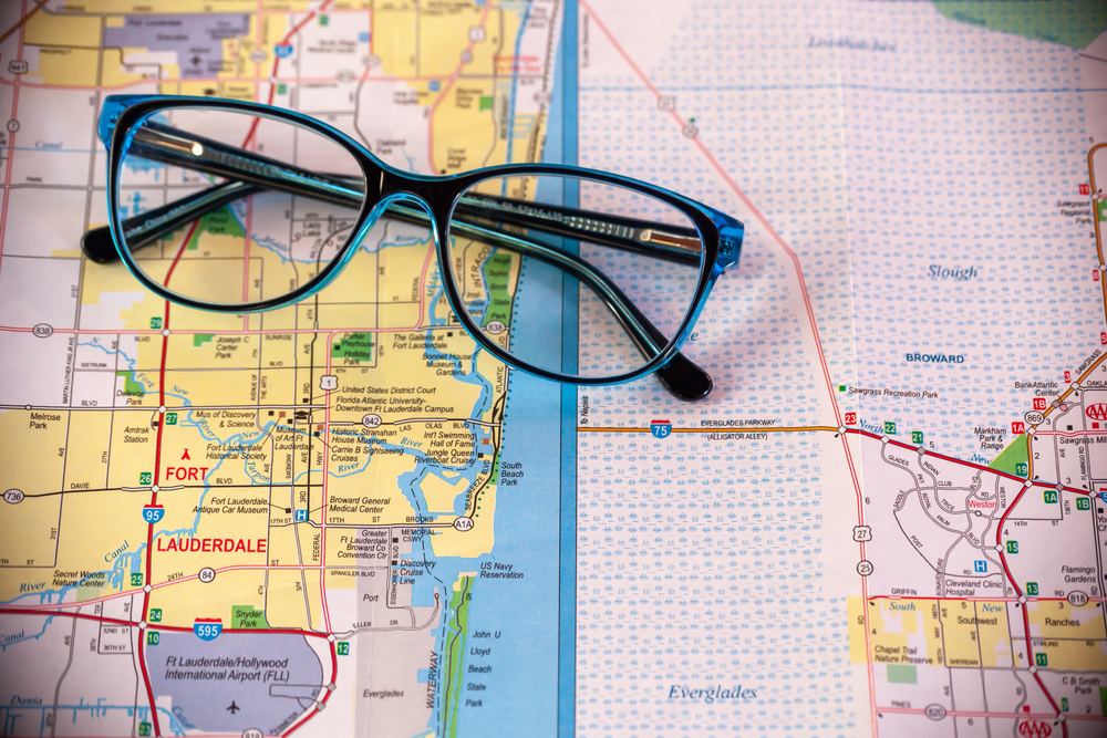 Pair of eyeglasses sits on a map of Fort Lauderdale