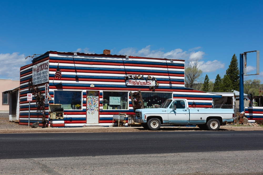 For a piece on where to stay in Bryce Canyon, an antique shop pictured on a blue sky day