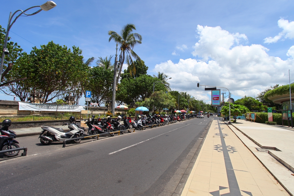Image of a shopping center and a large stretch of road outside Kuta, one of the best places to stay in Bali
