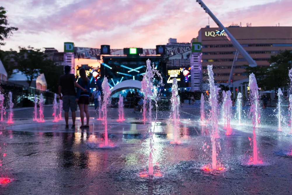 Fountains pictured in Quartier des Spectacles, one of the best areas to stay when visiting Montreal