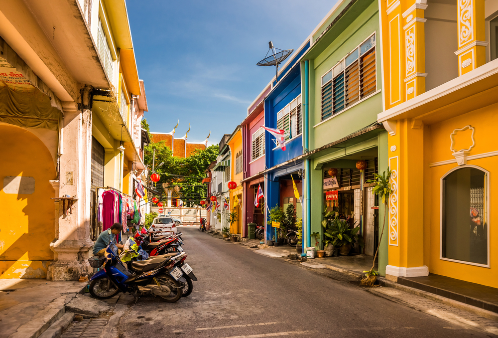 Old town, a top pick when considering where to stay in Phuket, pictured in the middle of colorful homes