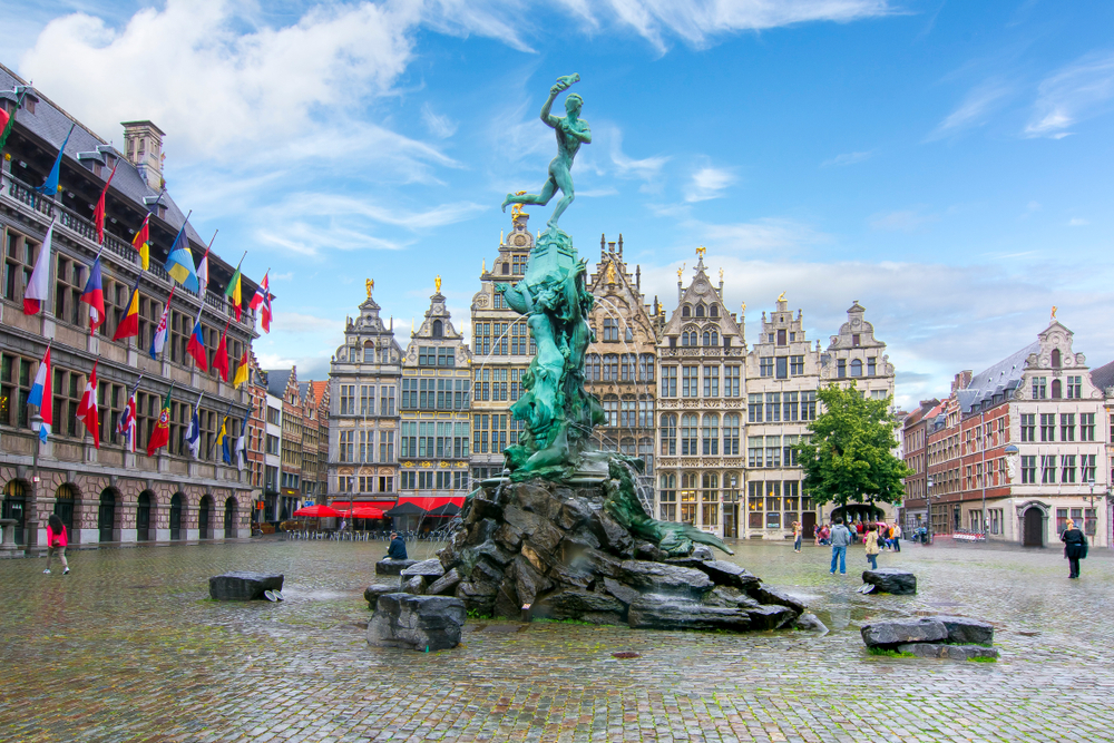 Brabo fountain in the Market Square in Antwerp in May, the overall cheapest time to visit Belgium
