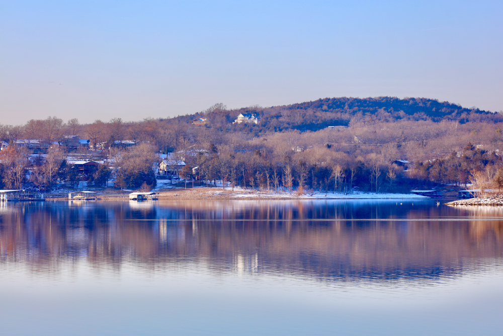 Reflections on the water at Table Rock Lake during winter, the cheapest time to visit Branson 
