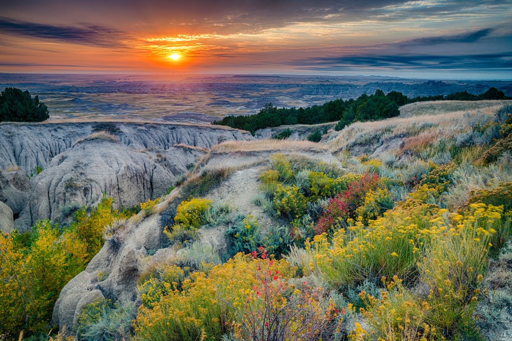 Sunrise over the scenery showing the overall best time to visit Badlands National Park in South Dakota