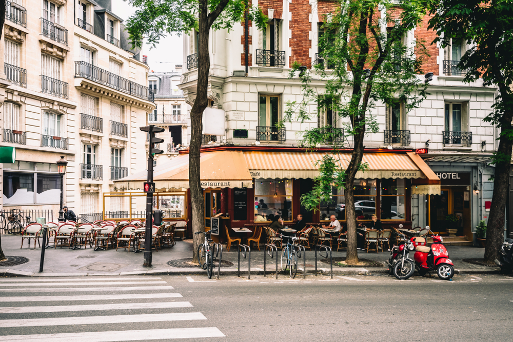 Cafe on the corner in Montmartre, a safe neighborhood in Paris for a piece on Is Paris Safe