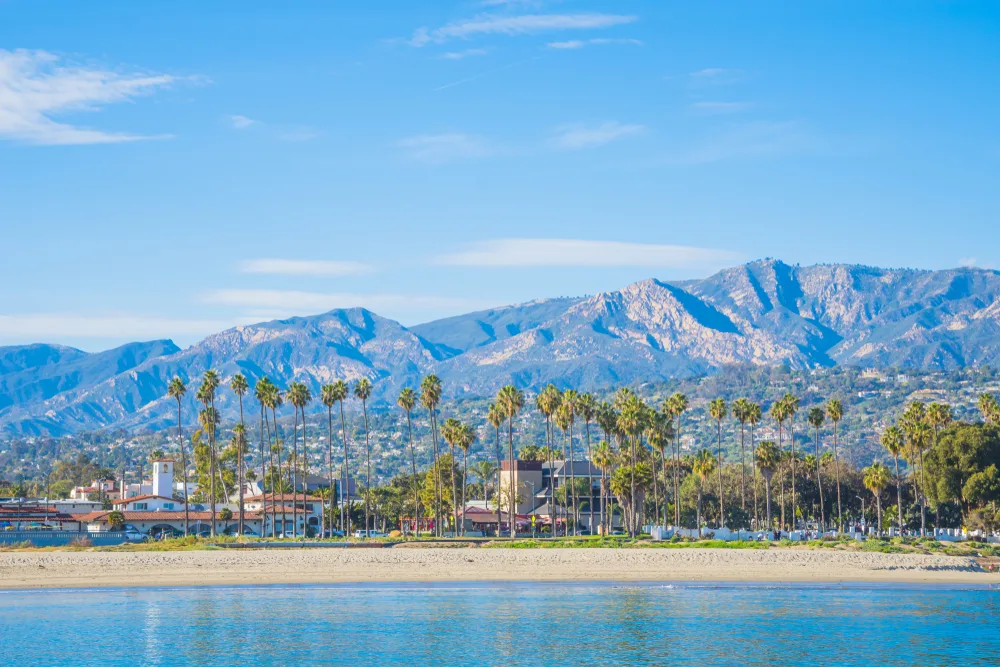 Wide view of shoreline and blue sky indicating the least busy time to visit Santa Barbara