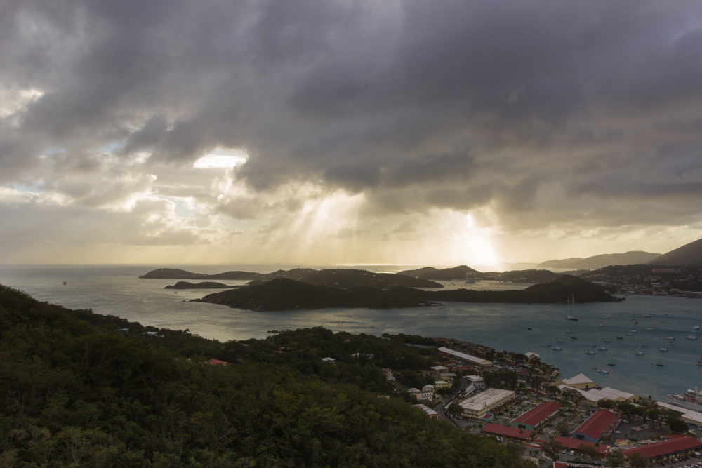 Gloomy skies and a dark storm cloud above the bay in St. Thomas pictured during the worst time to visit the US Virgin Islands