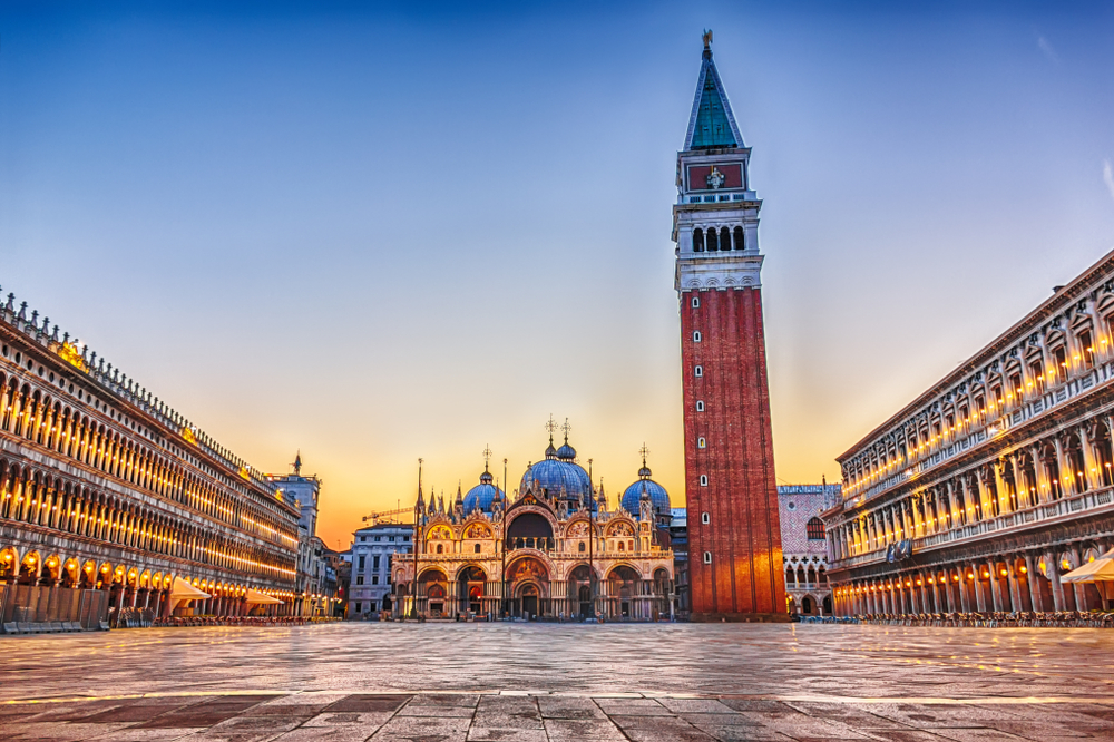 image of San Marco, a top pick for where to stay in Venice, pictured at dusk