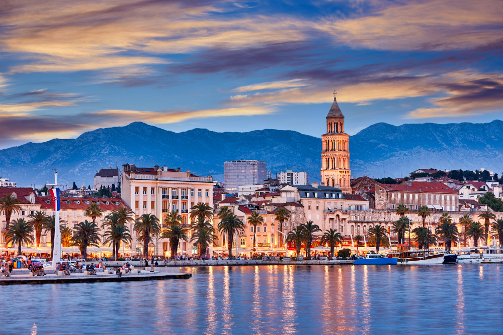Split city skyline at night featuring the Palace of the Emperor Diocletian for a piece on Is Croatia Safe