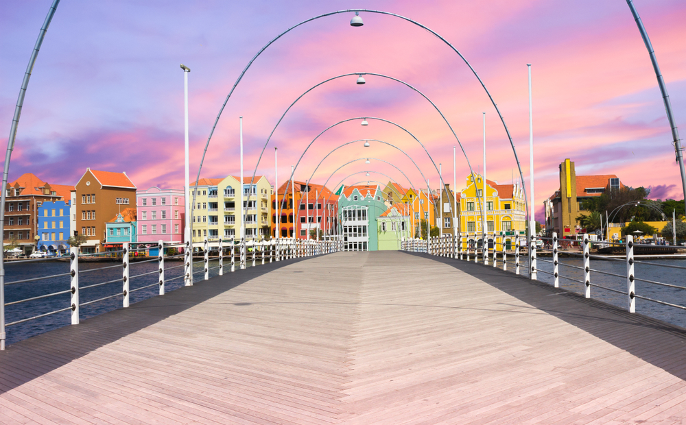 Gorgeous view looking down the pontoon bridge in Willemstad with nobody on it during the least busy time to visit Curacao