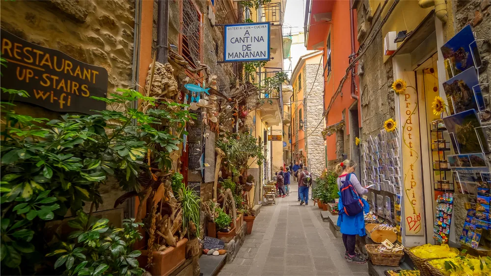 Narrow street in Corniglia, one of the best places to stay in Cinque Terre with lots of shopping and amenities