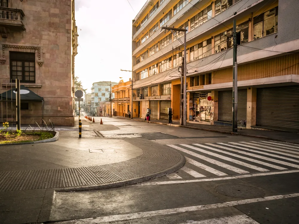 Empty streets in the middle of the city at sunrise with nobody walking and no cars during the COVID crisis during the least busy time to visit Guatemala