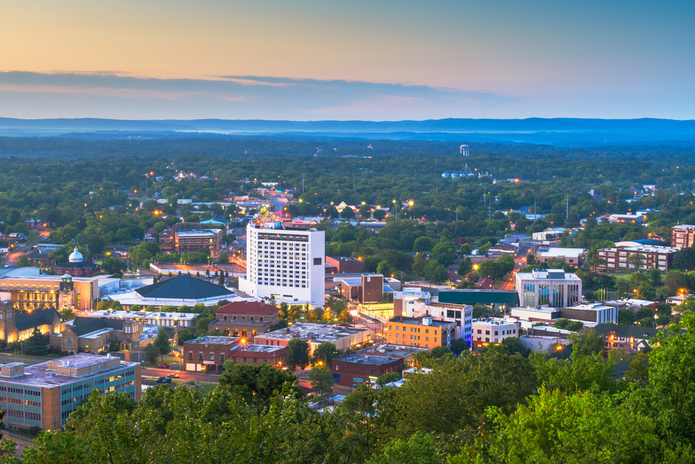 Aerial view of the town skyline at dawn for a frequently asked questions section on Hot Springs Arkansas