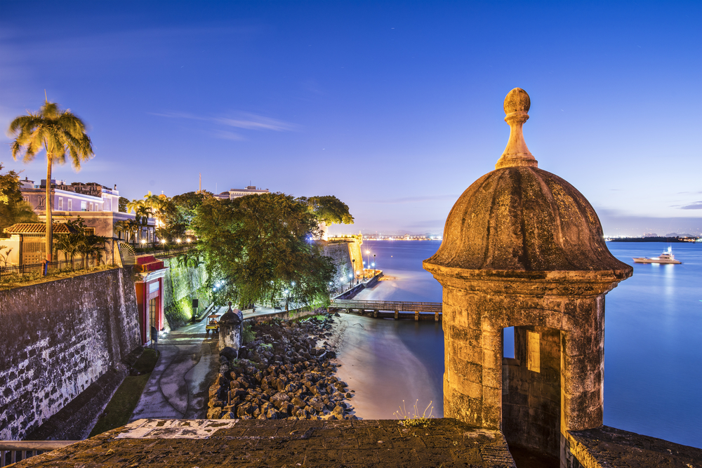 The Paseo de la Princesa pictured at dusk with gorgeous lights on it during the best time to visit San Juan